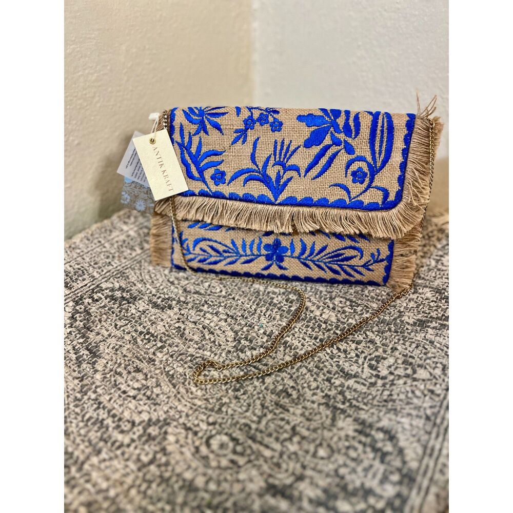 Antik Kraft jute clutch with blue embroidery and a chain strap NWT